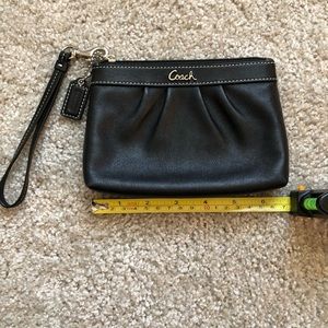 Coach black leather wristlet.
